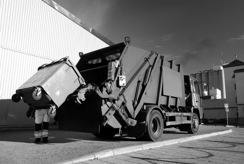 Waste removal trucks in Chelsea