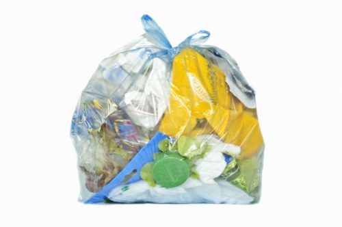 Measuring cubic yards of packed waste at a clearance site