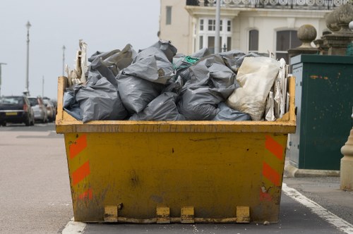Professionals clearing furniture from a Chelsea home